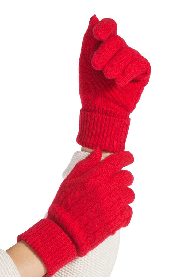 Woman's hands wearing Fishers Finery Pure cashmere cable knit gloves in bright red with rolled cuff 