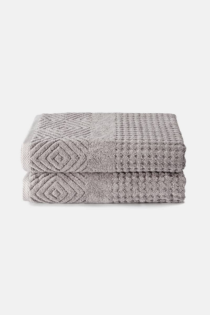 https://www.fishersfinery.com/cdn/shop/products/Texere-Cotton-Terry-Diamond-2-Bath-Towels-Light-Gray-HC263_1200x.jpg?v=1674513200