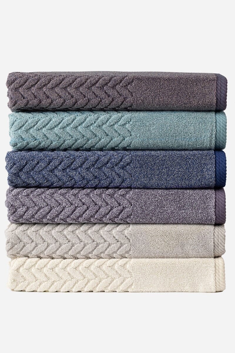 https://www.fishersfinery.com/cdn/shop/products/Texere-Stacked-Organic-Cotton-Towels-Cable-Knit-002-2_1600x.jpg?v=1674637797